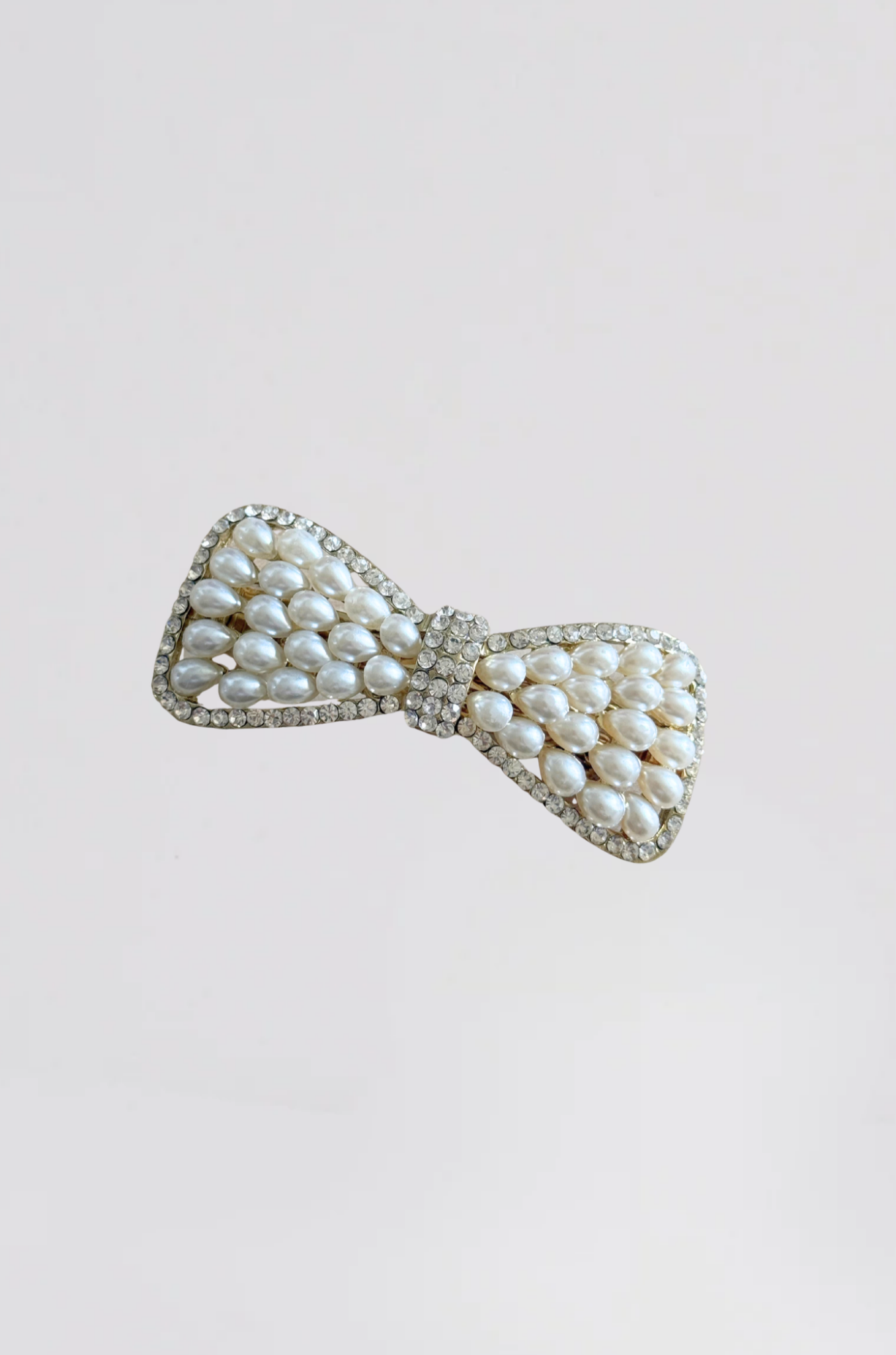 barrette dorée strass+perle noeud papillon - Photo 1